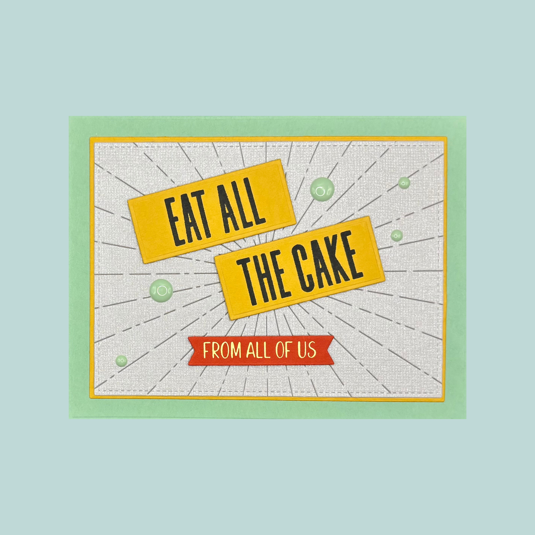 Card with text 'Eat all the cake from all of us' on a light blue background