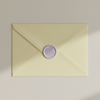 Pastel purple wax seal on light yellow envelope mockup